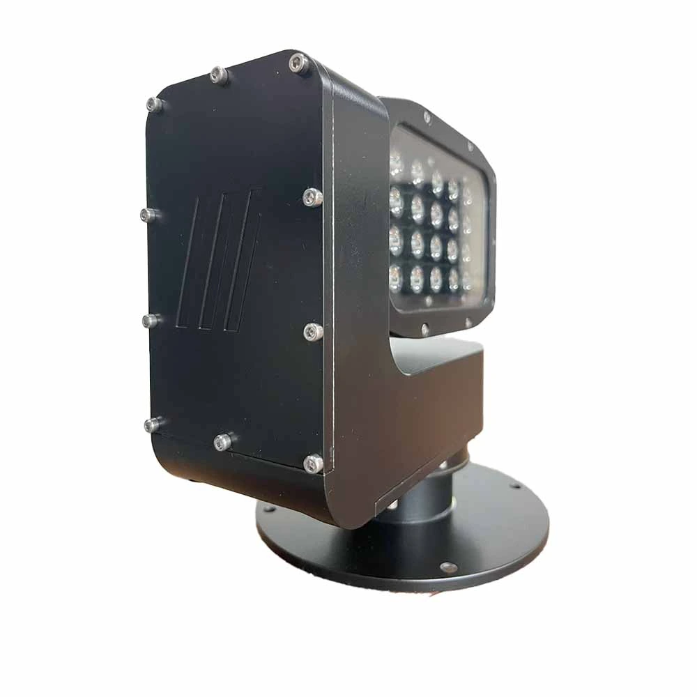T-Light Searchlight — vidalı kapaklı çatal yan gövdesi, arkada LED kafa, yuvarlak taban flanşı üzerinde